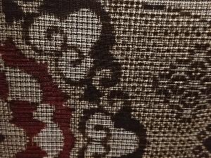 アンティーク　華紋織出し本場泥大島紬着物（割り込み絣）